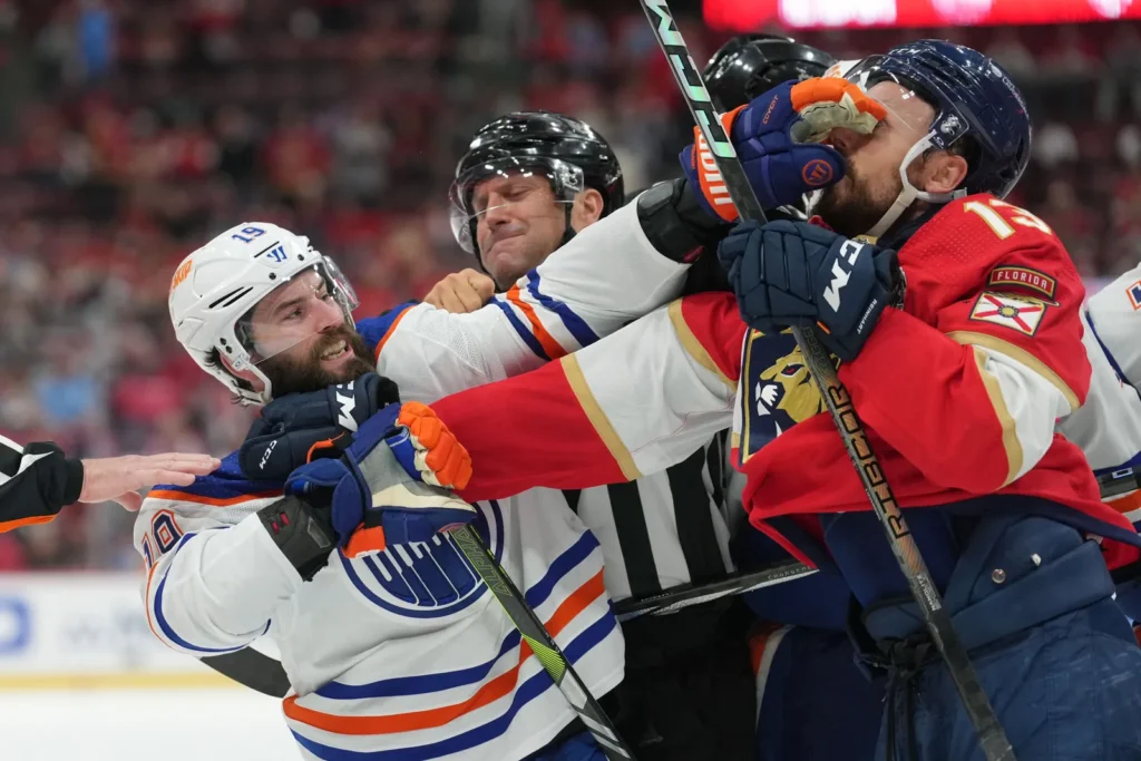 The current image has no alternative text. The file name is: NHL-hockey-fight-Edmonton-oilers-Henrique-Florida-Panther-Reinhart-fight-Stanley-Cup-FIinals-June-2024.webp
